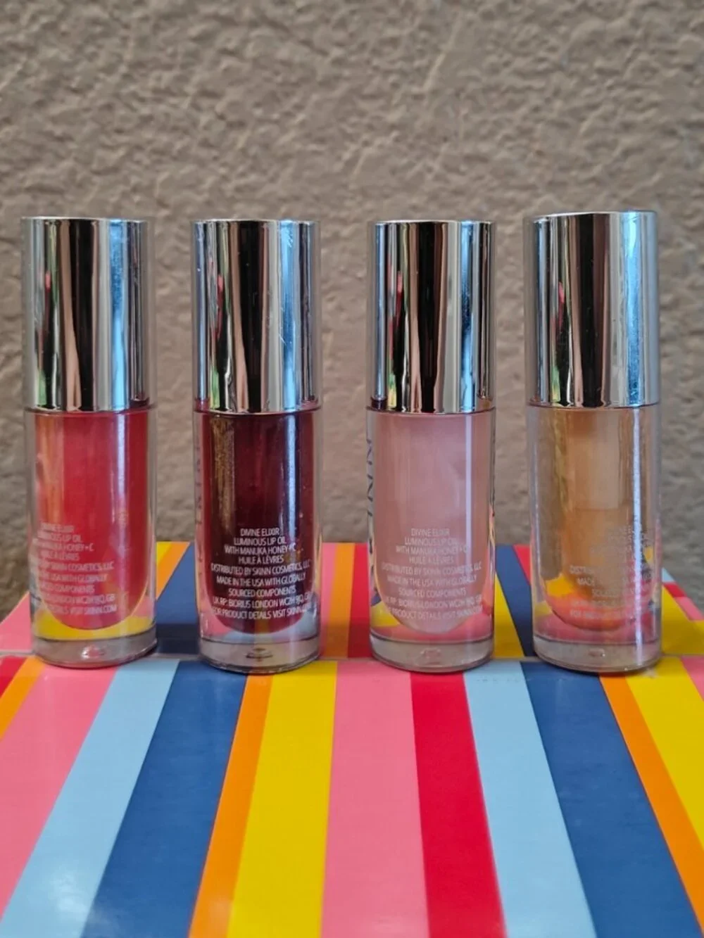 SKINN DIVINE ELIXIR  Luminous Lip Oil 4 in one set New sealed